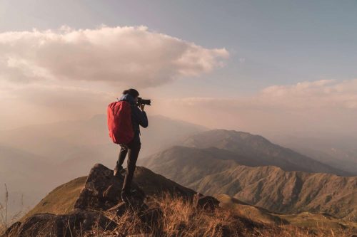 young-man-traveler-with-backpack-taking-a-photo-on-2025-03-10-01-51-17-utcResized_6_11zon-e1754017425968.jpg